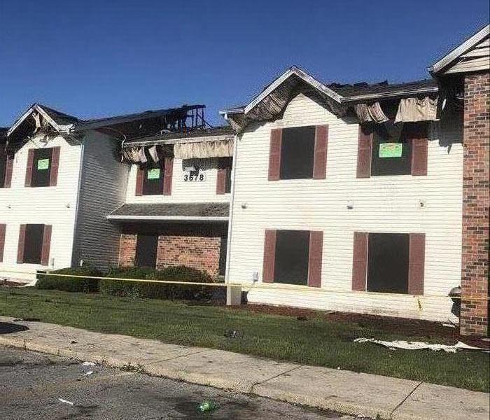Board up services after fire damage at apartment complex